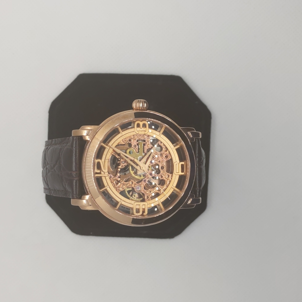 Alribos rose gold skeletonized automatic watch